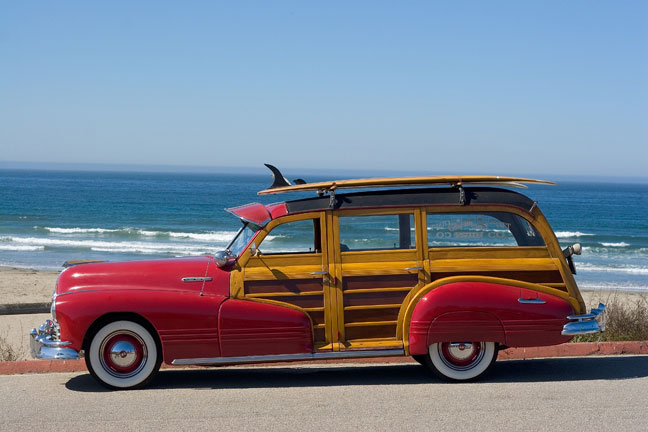 woodie car with surfboards