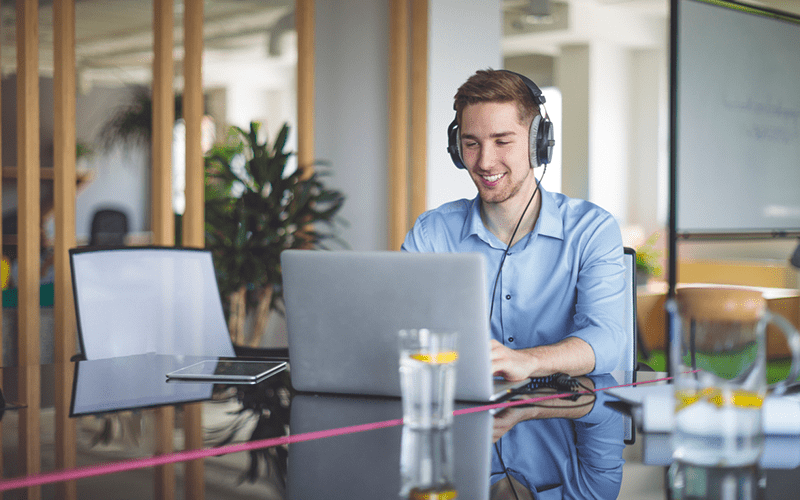 Website Search man using his laptop