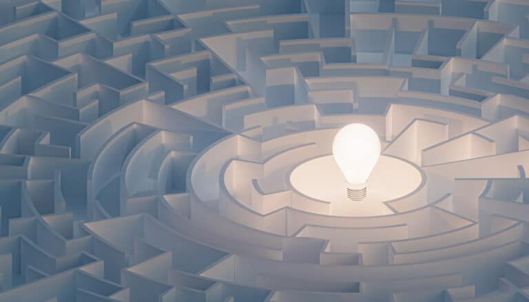 Circular maze or labyrinth with light bulb in its center. Puzzle, riddle, intelligence, thinking, solution, IQ, cognitive search concepts.