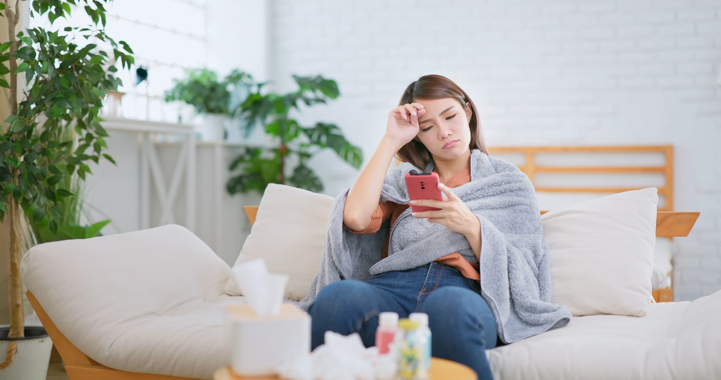 woman searching for cold remedies on her mobile device feeling frustrated that her search experience is not including relevant related results
