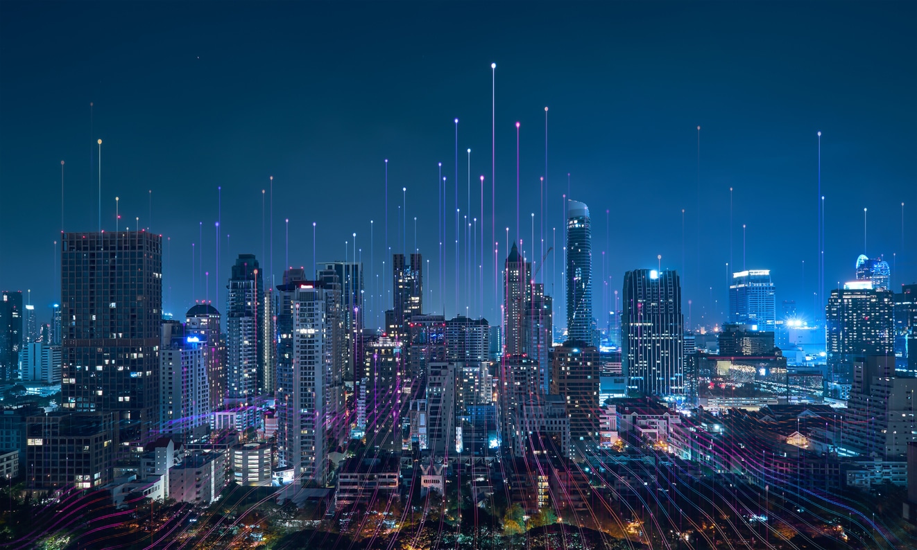 A futuristic cityscape at night, illuminated by interconnected lines of light representing the flow of real-time data and dynamic pricing algorithms in action, optimizing prices and driving business decisions in the digital age.