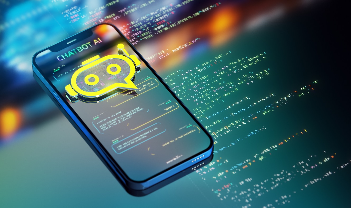 A smartphone displays a "Chatbot AI" app with a yellow chat bubble icon, floating above lines of code, symbolizing the integration of artificial intelligence into conversational interfaces.