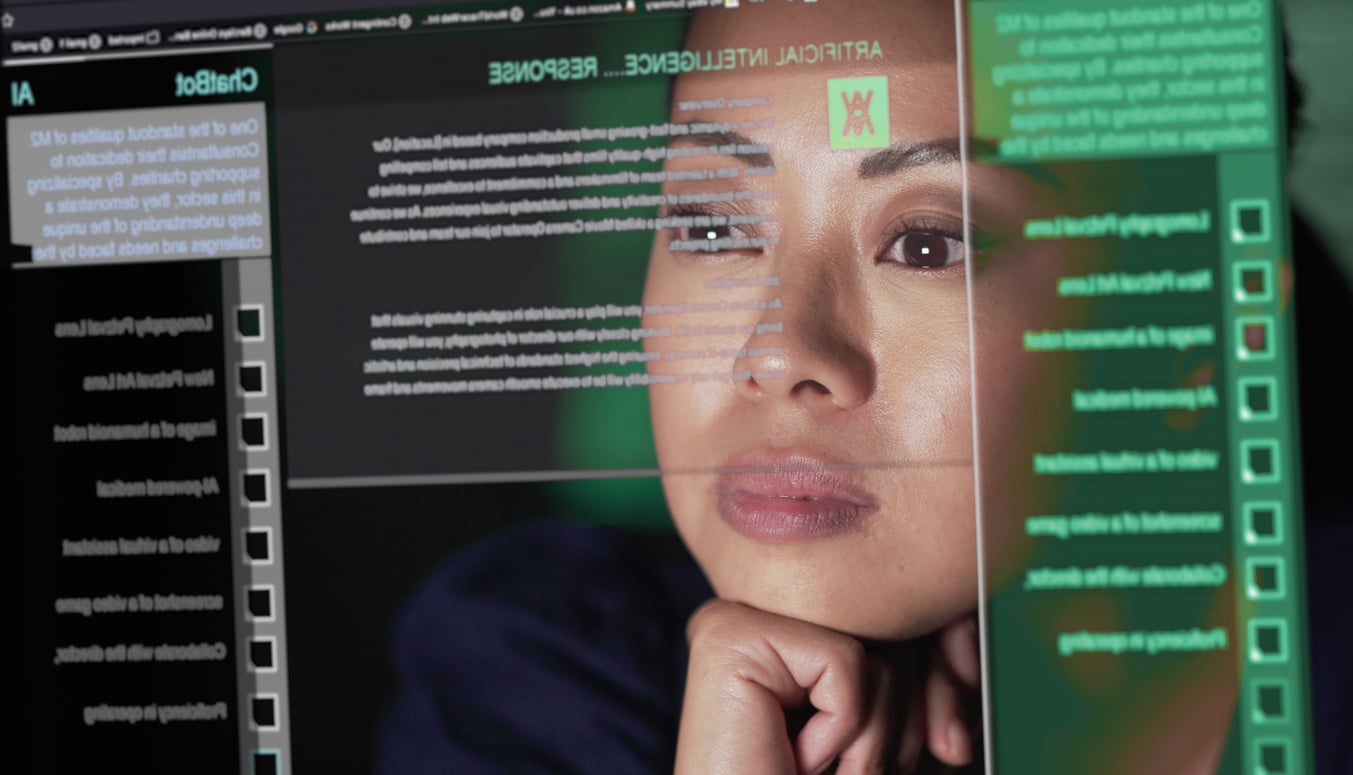 Asian woman studying a see through screen which is producing lines of AI generated text. A ChatBot similar to A.I. is being read attentively by this woman, representing increased generative AI adoption and concerns around Gen AI.