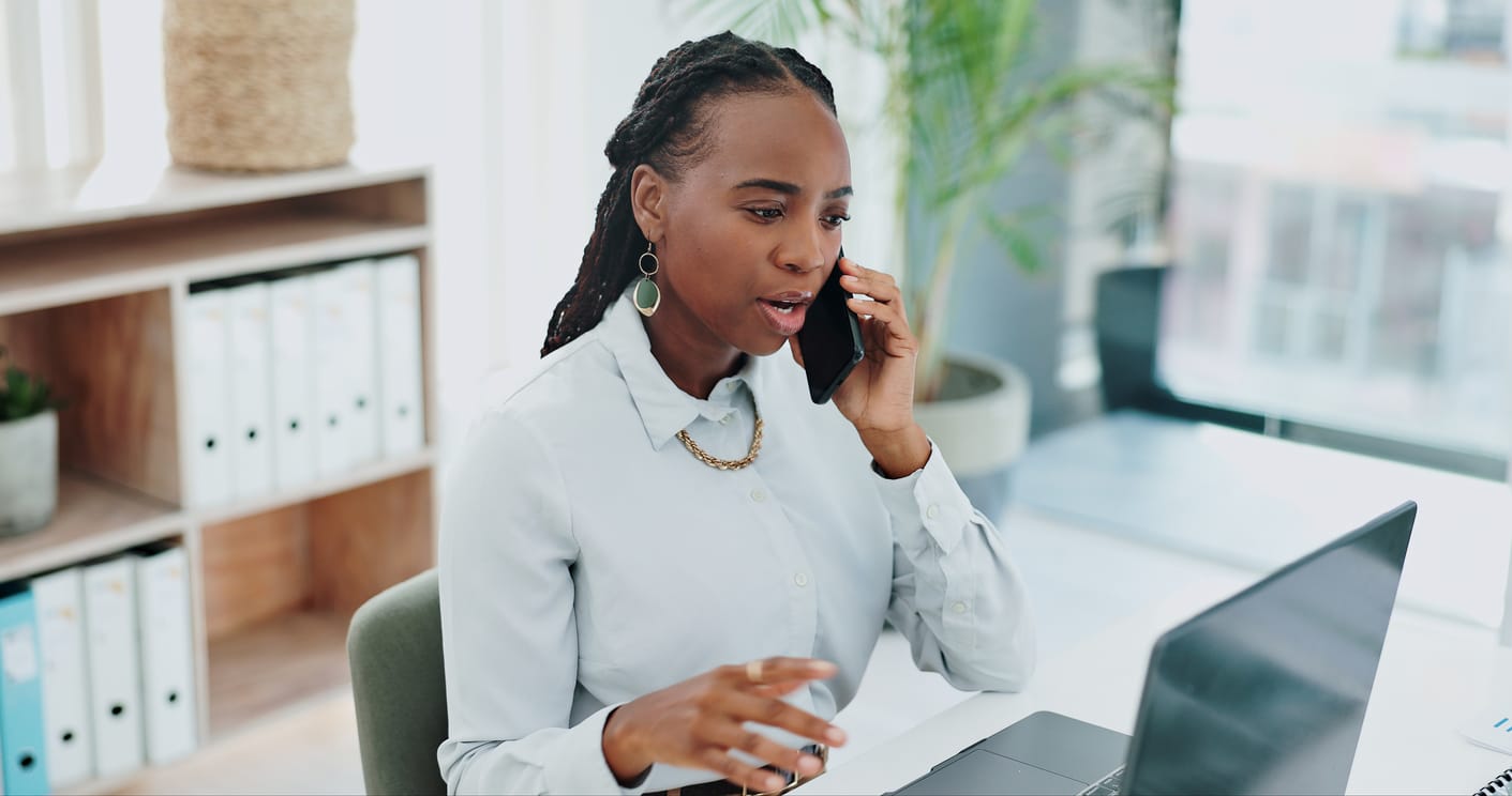 Business woman, phone call and laptop for online research in office and talking of information on enterprise search website.