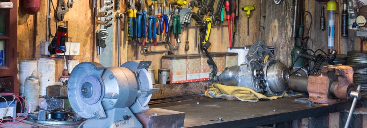 motorcycle parts and tools on the desktop in garage picture id916246140
