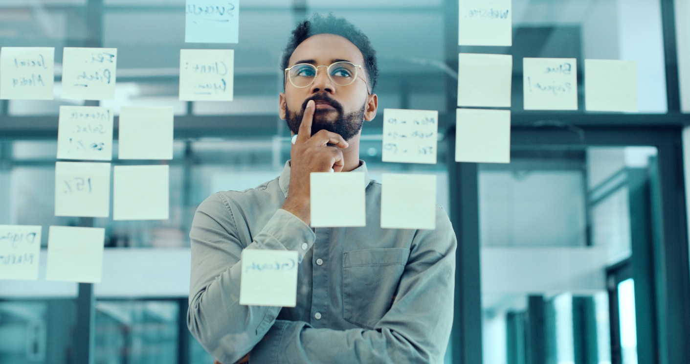 Shot of a young businessman having a brainstorming session in a modern office