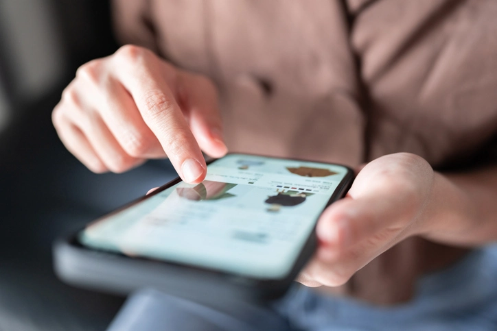 Person shopping on mobile device