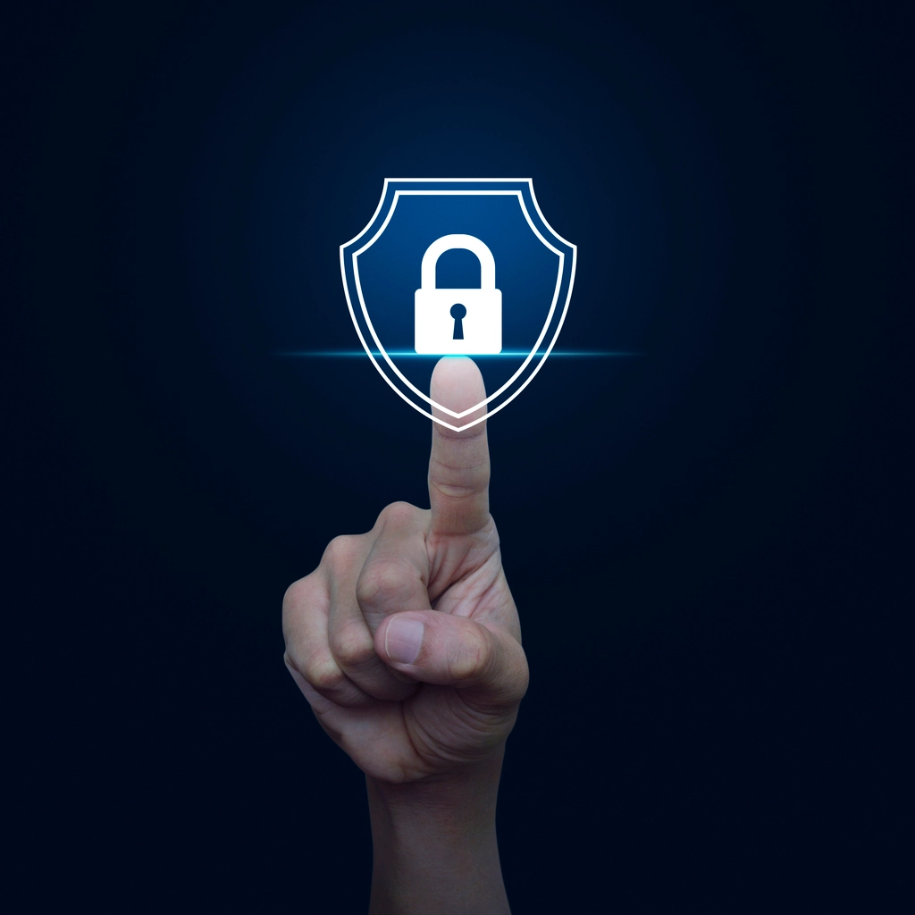 Hand pressing security shield icon